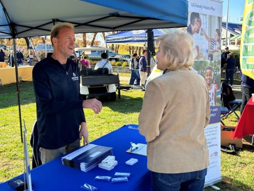 Member visits USFHP tent at 2023 2023 Navy Fest in Annapolis, Maryland.